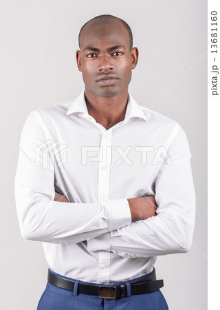 Black man wearing casual clothes in black background Black man wearing casual clothes in black background 13681160