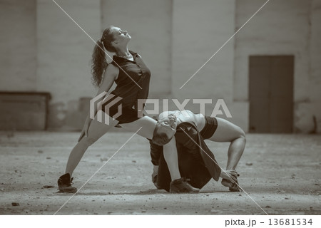 Beautiful couple of professional artists dancing 13681534