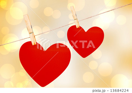 Composite image of hearts hanging on a line Composite image of hearts hanging on a line 13684224