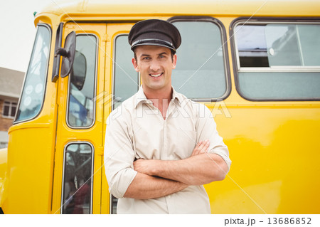 Smiling bus driver looking at camera Smiling bus driver looking at camera 13686852