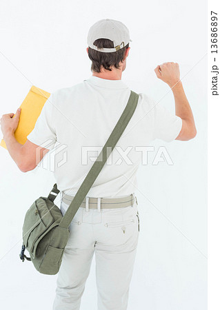 Delivery man with envelop knocking on white background 13686897
