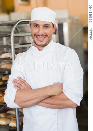 Smiling baker looking at camera 13691440