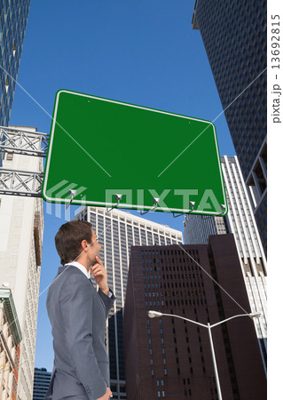 Composite image of thinking businessman Composite image of thinking businessman 13692815