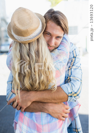 Attractive couple standing and hugging Attractive couple standing and hugging 13693120