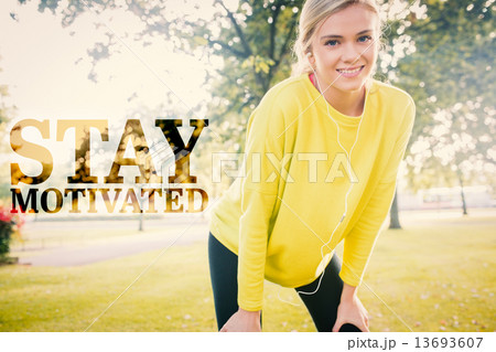Composite image of active cheerful blonde pausing after a run 13693607