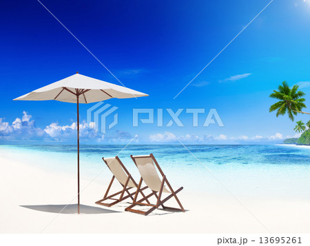 Deck Chair on Tropical Beach 13695261
