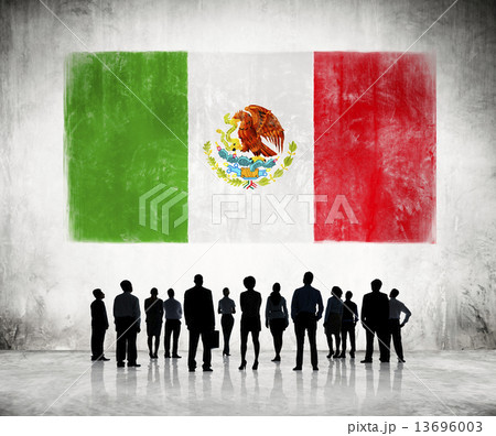 Silhouettes of Business People Looking at the Mexican Flag 13696003