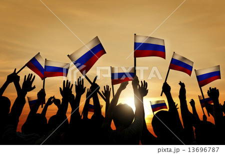 Group of People Waving Russian Flags in Back Lit Group of People Waving Russian Flags in Back Lit 13696787