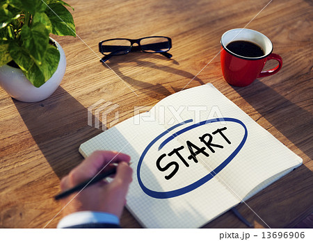 Businessman Writing the Word "Start" 13696906
