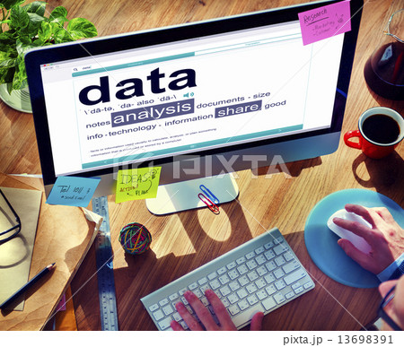 Man Reading the Definition of Data 13698391