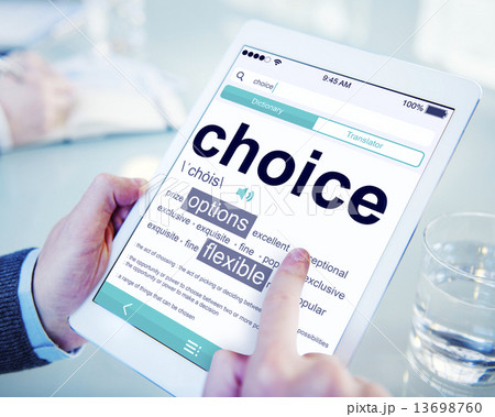 Man Reading the Definition of Choice 13698760