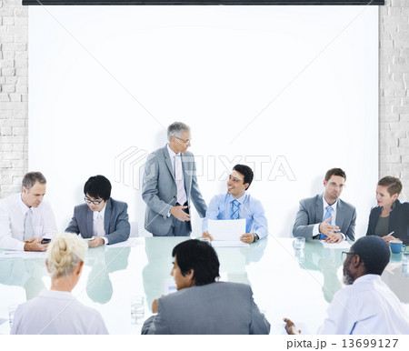 Multiethnic Group of People Meeting in the Office 13699127