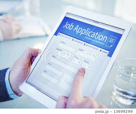 Applicant Filling Up the Online Job Application 13699299