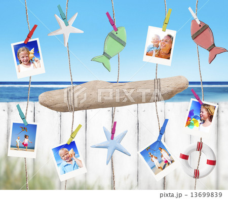 Family Pictures and Objects Hanging by the Beach Family Pictures and Objects Hanging by the Beach 13699839