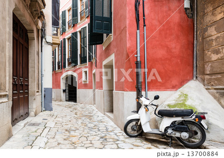 Colorful narrow street in old mediterranean town Colorful narrow street in old mediterranean town 13700884