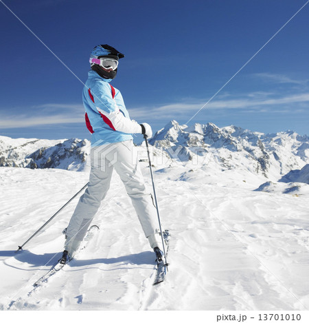 woman skier, Alps Mountains, Savoie, France woman skier, Alps Mountains, Savoie, France 13701010