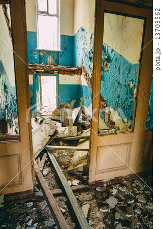 Dilapidated passage in school of Pripyat. Chernobyl Disaster 13703562