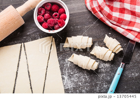 Making croissants with raspberries Making croissants with raspberries 13705445