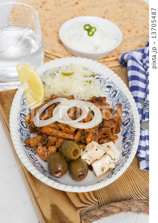 Gyros with Tzatziki Coleslaw olives and feta cheese Gyros with Tzatziki Coleslaw olives and feta cheese 13705487