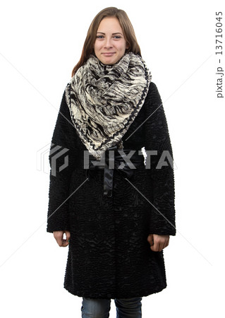 Photo of the young smiling woman in winter coat 13716045