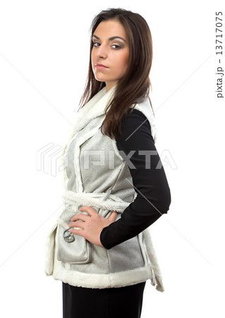 Photo of serious brunette in fake fur waistcoat 13717075