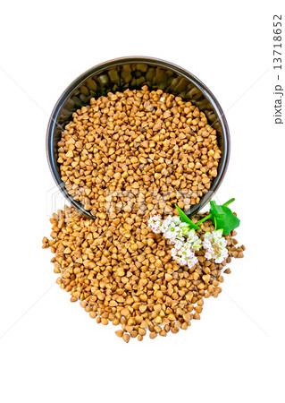 Buckwheat in brown bowl with flower Buckwheat in brown bowl with flower 13718652