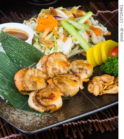 japanese cuisine. grilled shell fish on the background japanese cuisine. grilled shell fish on the background 13720461