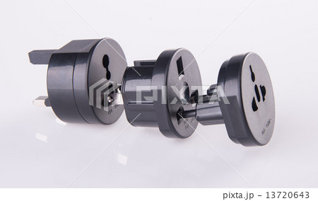 Travel plug adapter on a background 13720643