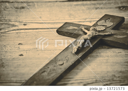 Old cross with jesus on the old floor 13721573