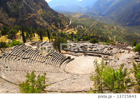 Ancient amphitheater and ruins of Temple of Apollo in Delphi, Gr 13725643