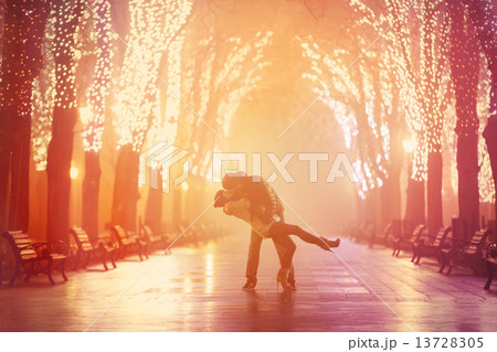 Couple kissing at night alley. Couple kissing at night alley. 13728305