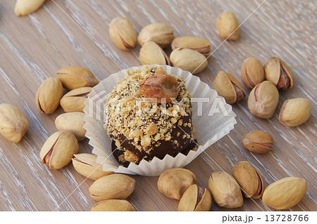 Handmade chocolate truffle with pistachios 13728766