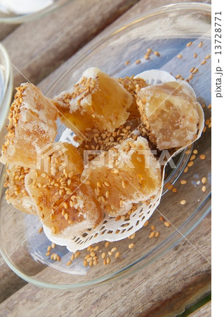 Turkish delight with sesame seeds on the plate Turkish delight with sesame seeds on the plate 13728771