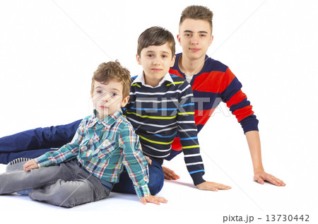 Shot studio with three boys brothers 13730442