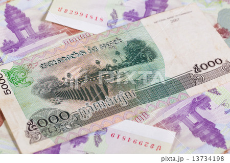 Different Cambodia Riels banknotes on the table Different Cambodia Riels banknotes on the table 13734198