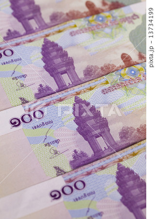 Different Cambodia Riels banknotes on the table 13734199