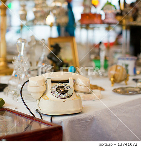 Vintage telephone on a Parisian flea market 13741072