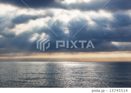 sunrise over calm ocean sunrise over calm ocean 13745514