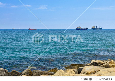 Cargo ships on horizon 13745843