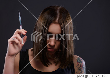 Teenage girl suffering from drug addiction 13746158