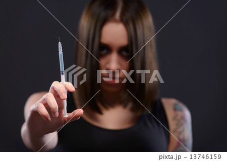 Teenage girl suffering from drug addiction Teenage girl suffering from drug addiction 13746159