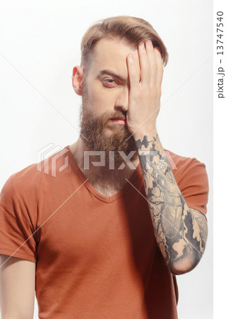 Handsome bearded man with headache 13747540