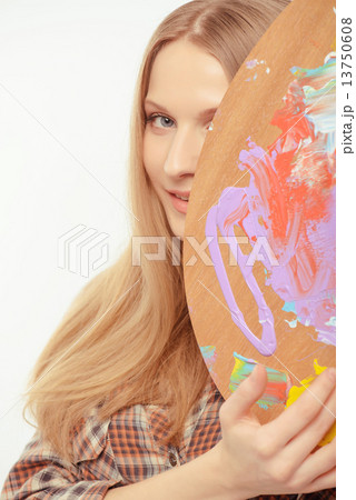 Young beautiful artist posing with a palette Young beautiful artist posing with a palette 13750608
