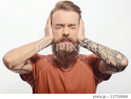 Handsome bearded man with headache 13750666