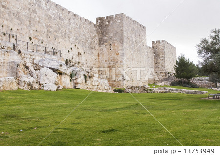 Defensive wall of the ancient holy Jerusalem . Defensive wall of the ancient holy Jerusalem . 13753949