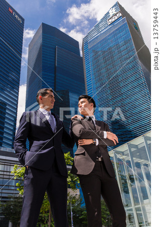 Business man infront building Business man infront building 13759443