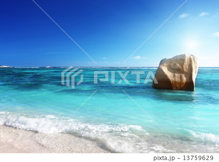 sunset on the beach, Anse Source d'Argent, La Digue island, Seyc 13759629