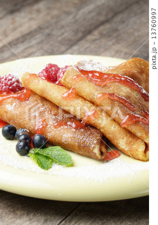 Crepe with raspberries and blueberries Crepe with raspberries and blueberries 13760997