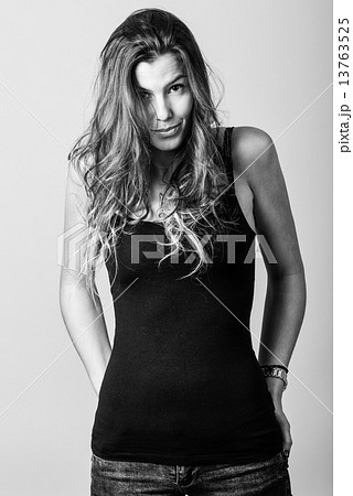 Woman, model of fashion, wearing casual clothes Woman, model of fashion, wearing casual clothes 13763525