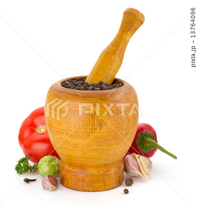 mortar with pestle and spices on white mortar with pestle and spices on white 13764096